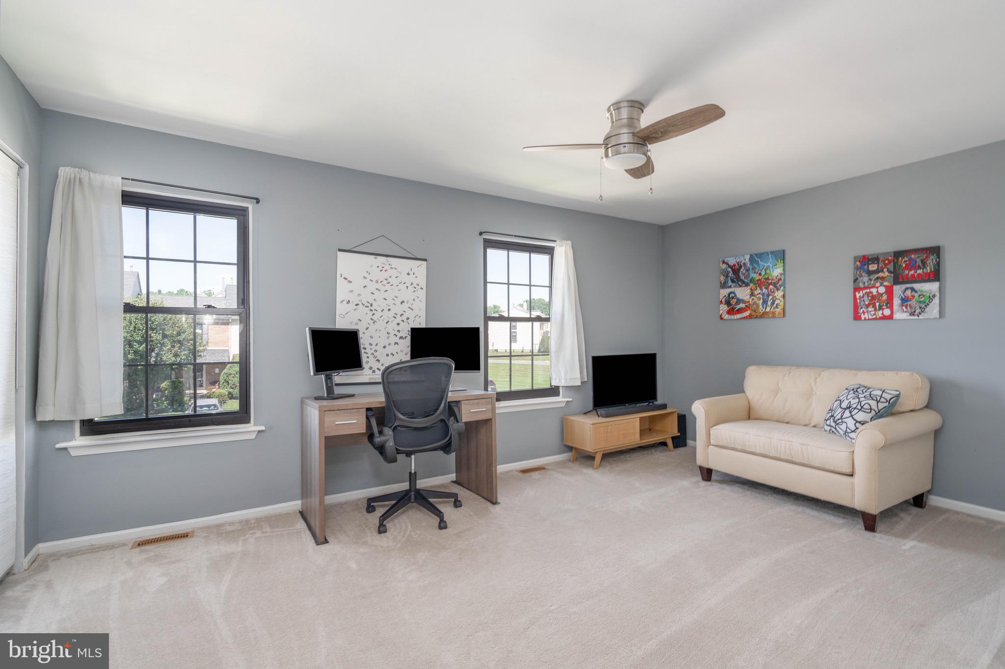 104 Bradbury Road Brookhaven, PA 19015 - Photo 15 of 29 a living room with furniture and a window