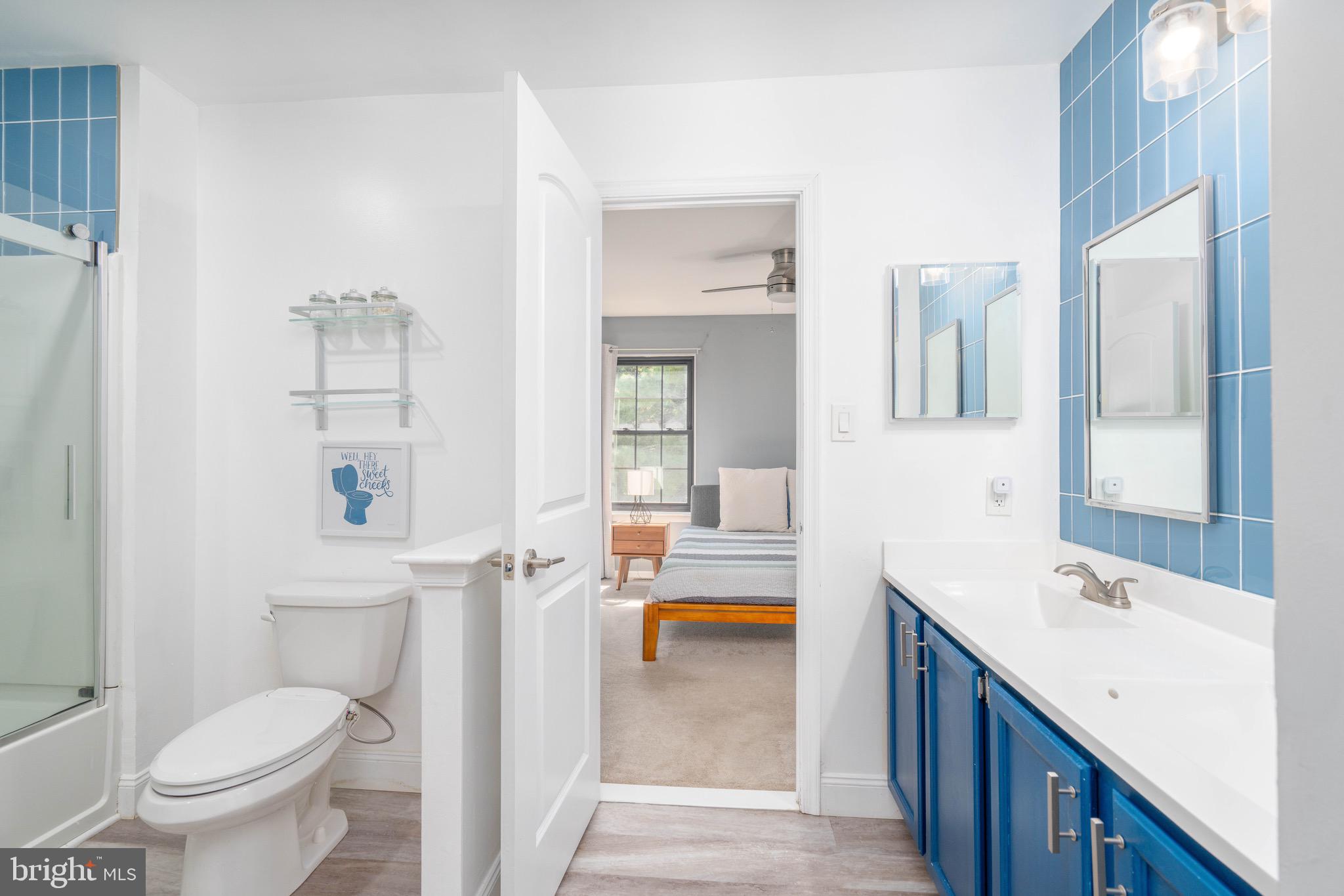 104 Bradbury Road Brookhaven, PA 19015 - Photo 19 of 29 a bathroom with a sink a toilet and shower