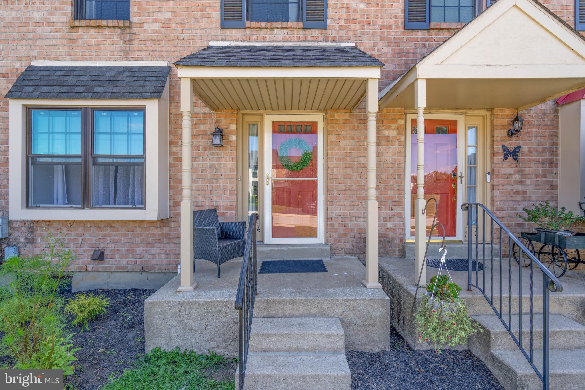104 Bradbury Road Brookhaven, PA 19015 - Photo 2 of 29 a front view of a house with a porch