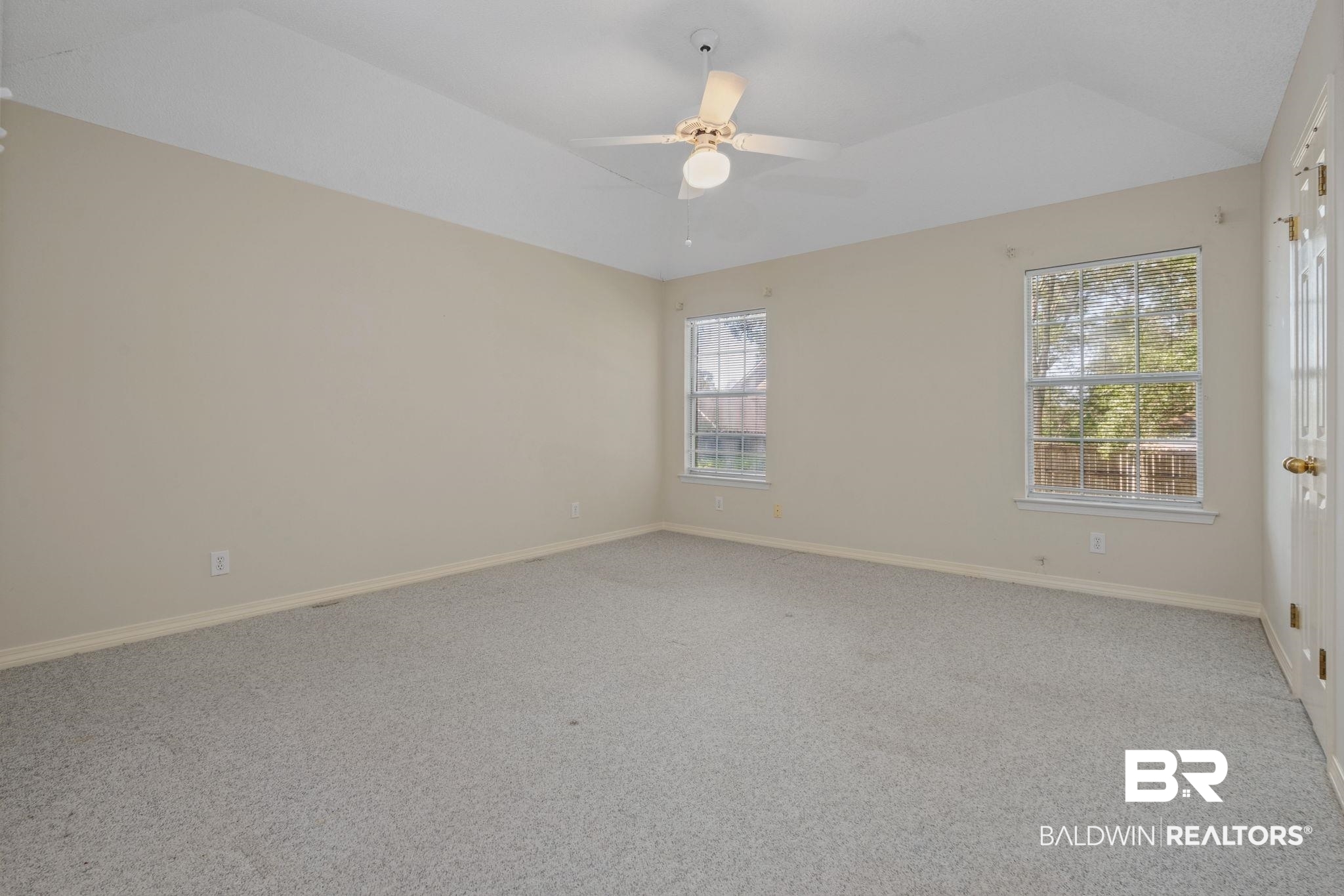 1340 Wellsley Court Mobile, AL 36695 - Photo 29 of 37 Unfurnished room featuring light carpet, ceiling fan, and vaulted ceiling