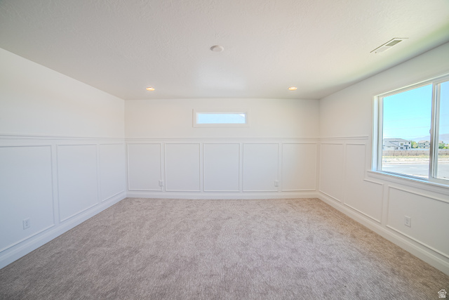 45 North Scarlet Maple Road, Unit 4317 Vineyard, UT 84059 - Photo 26 of 35 Bright interior space featuring wainscoting, recessed lighting, and soft gray carpeting