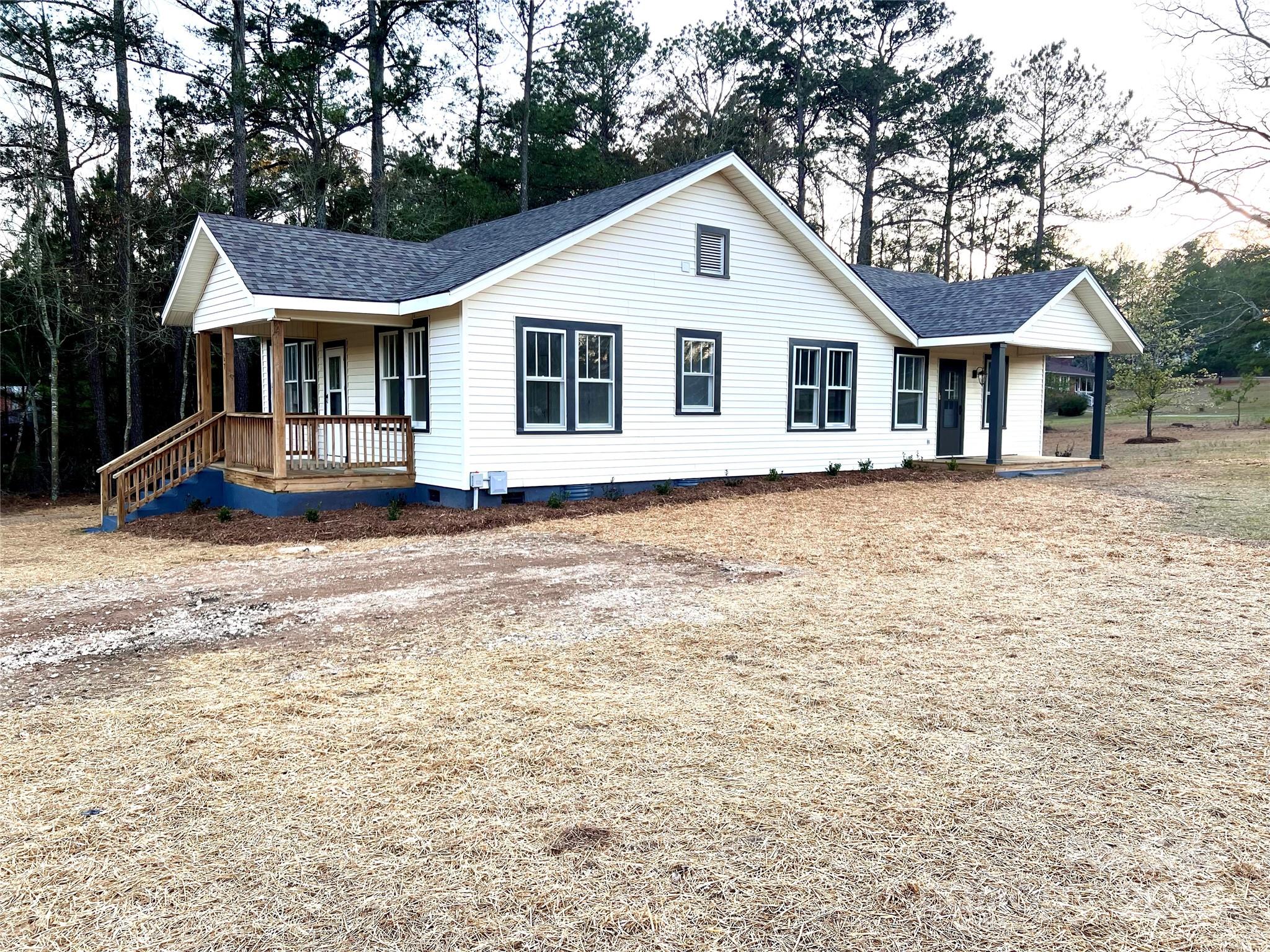 167 Ellerbe Road Rockingham, NC 28379 - Photo 6 of 22 a front view of a house with a yard