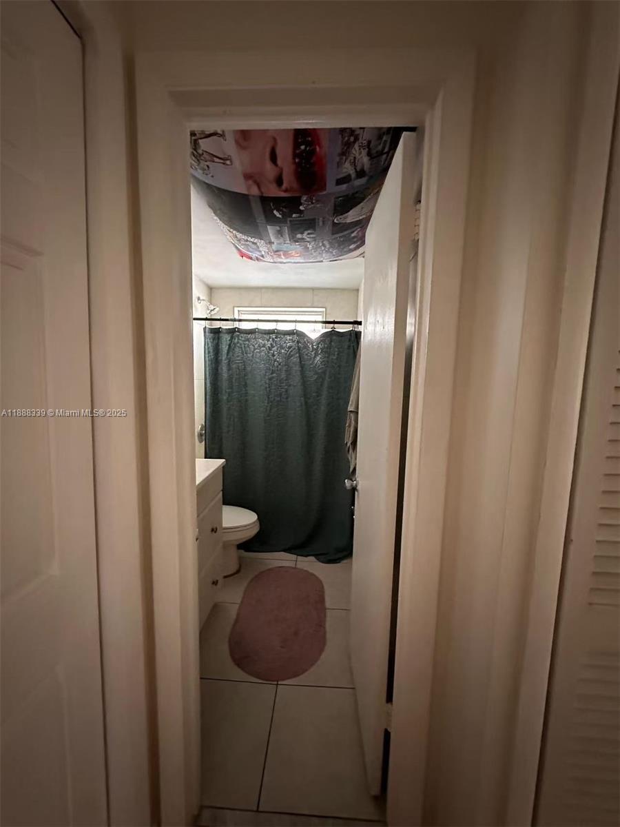 1021 Crystal Lake Drive, Unit 311 Deerfield Beach, FL 33064 - Photo 12 of 17 a view of walk in closet