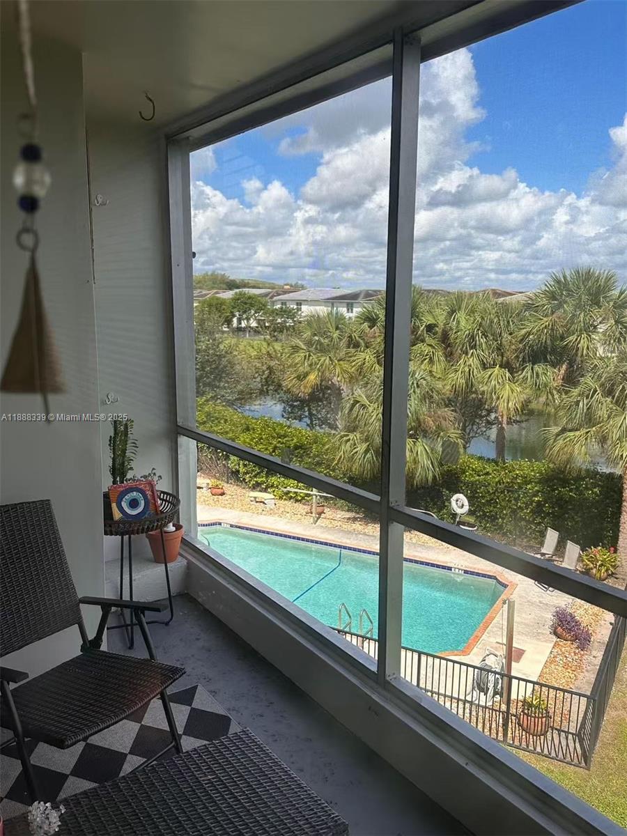 1021 Crystal Lake Drive, Unit 311 Deerfield Beach, FL 33064 - Photo 15 of 17 a view of a city from a balcony