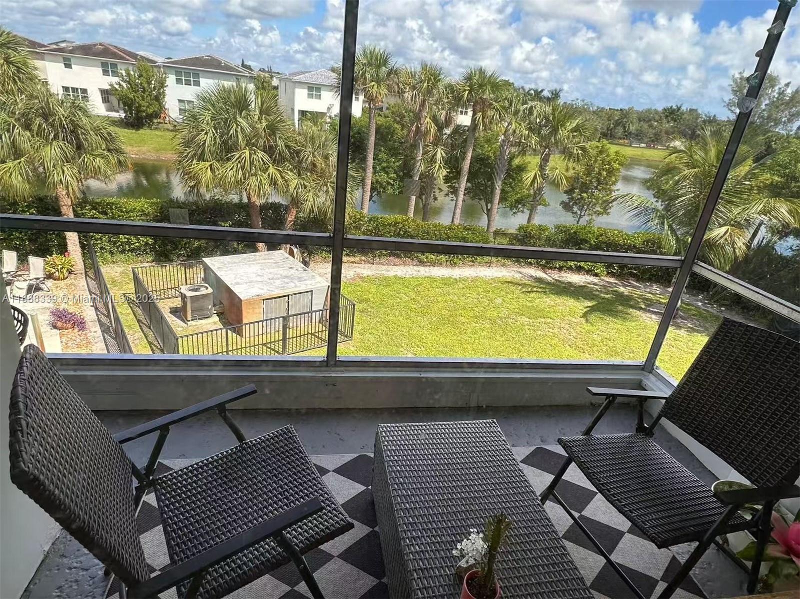 1021 Crystal Lake Drive, Unit 311 Deerfield Beach, FL 33064 - Photo 16 of 17 a view of swimming pool from a balcony