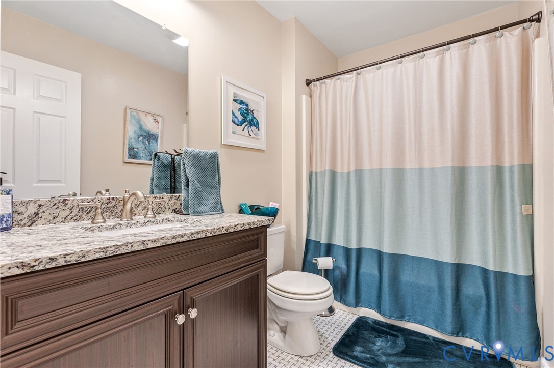 1373 Butler Branch Road Petersburg, VA 23805 - Photo 19 of 28 Full bath with vanity, a shower with curtain, and