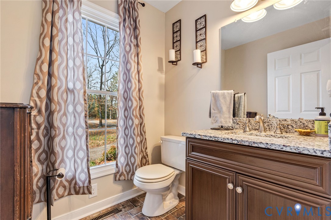 1373 Butler Branch Road Petersburg, VA 23805 - Photo 20 of 28 Bathroom featuring vanity and baseboards