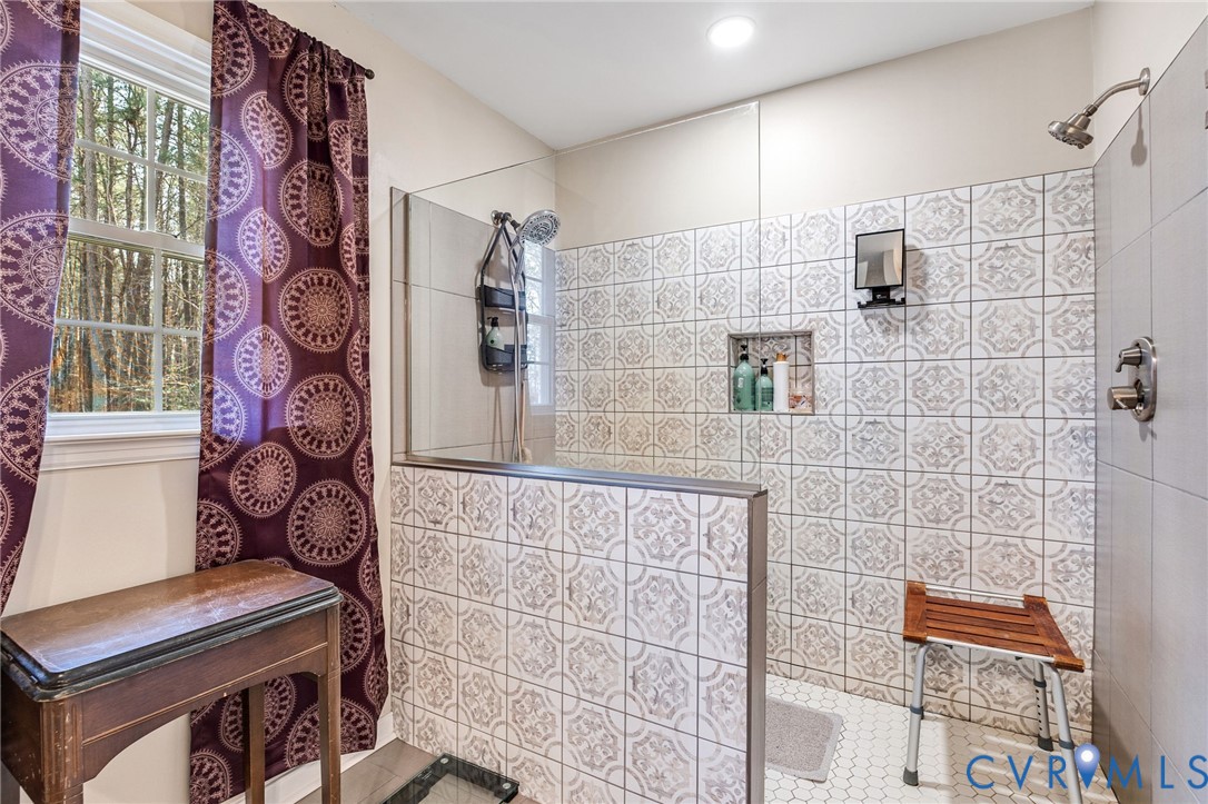 1373 Butler Branch Road Petersburg, VA 23805 - Photo 21 of 28 Full bath with a walk in shower and tile walls