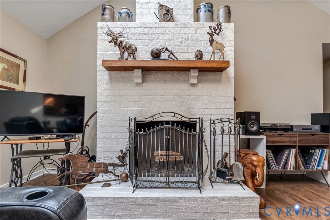 1373 Butler Branch Road Petersburg, VA 23805 - Photo 5 of 28 Detailed view of a brick fireplace, wood finished