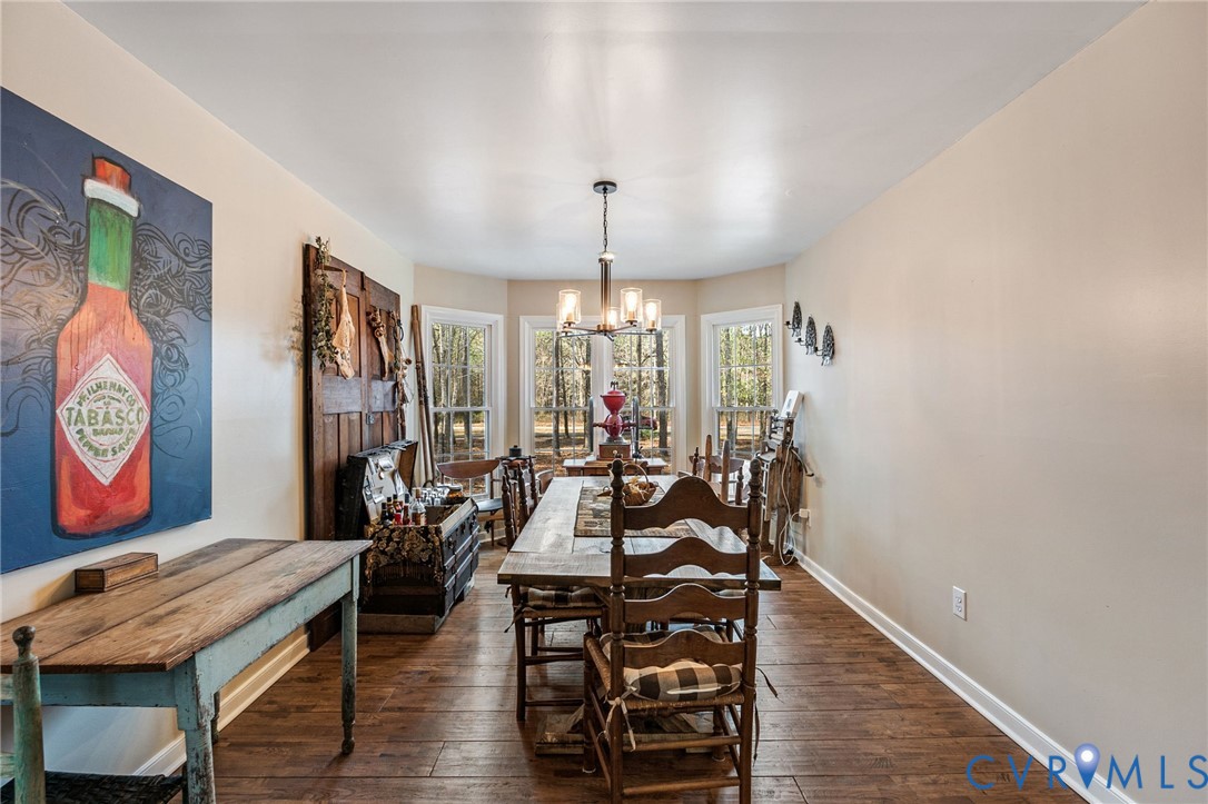 1373 Butler Branch Road Petersburg, VA 23805 - Photo 9 of 28 Dining space featuring suspended lighting and dark
