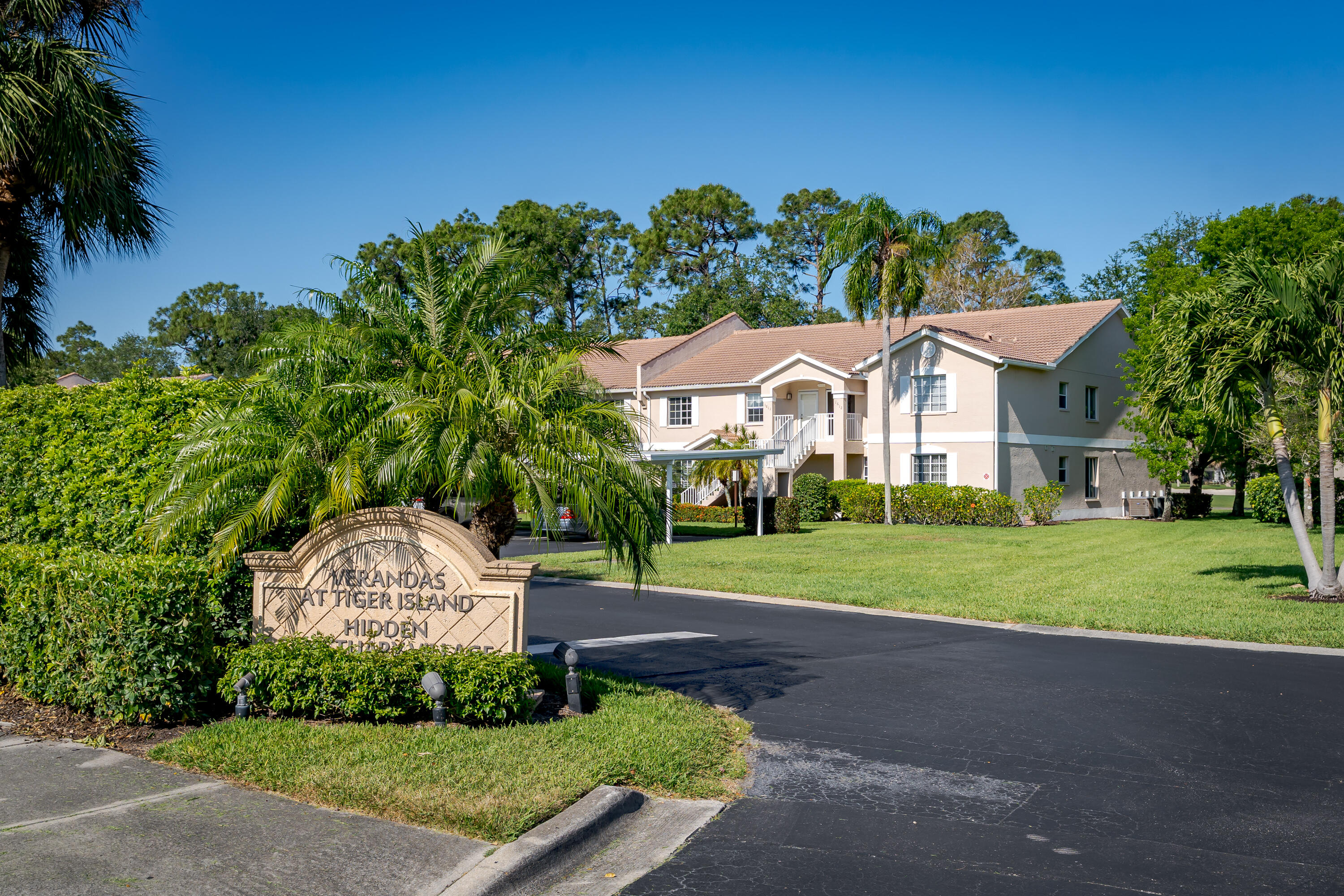 8065 Tiger Cove, Unit 1611 Naples, FL 34113 - Photo 1 of 40 Front view of condo 1611 Tiger Cove