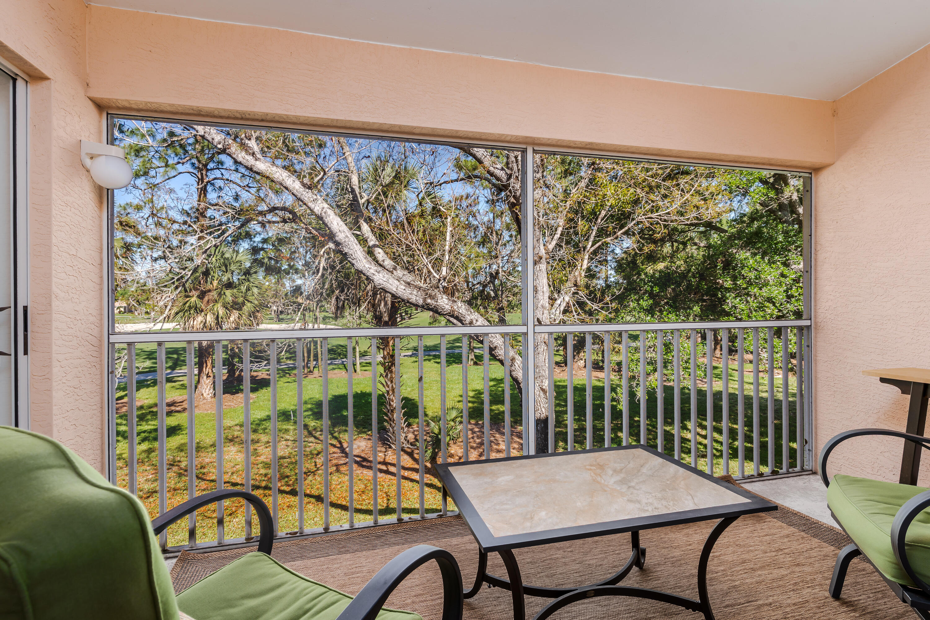 8065 Tiger Cove, Unit 1611 Naples, FL 34113 - Photo 15 of 40 Lanai looking at golf course