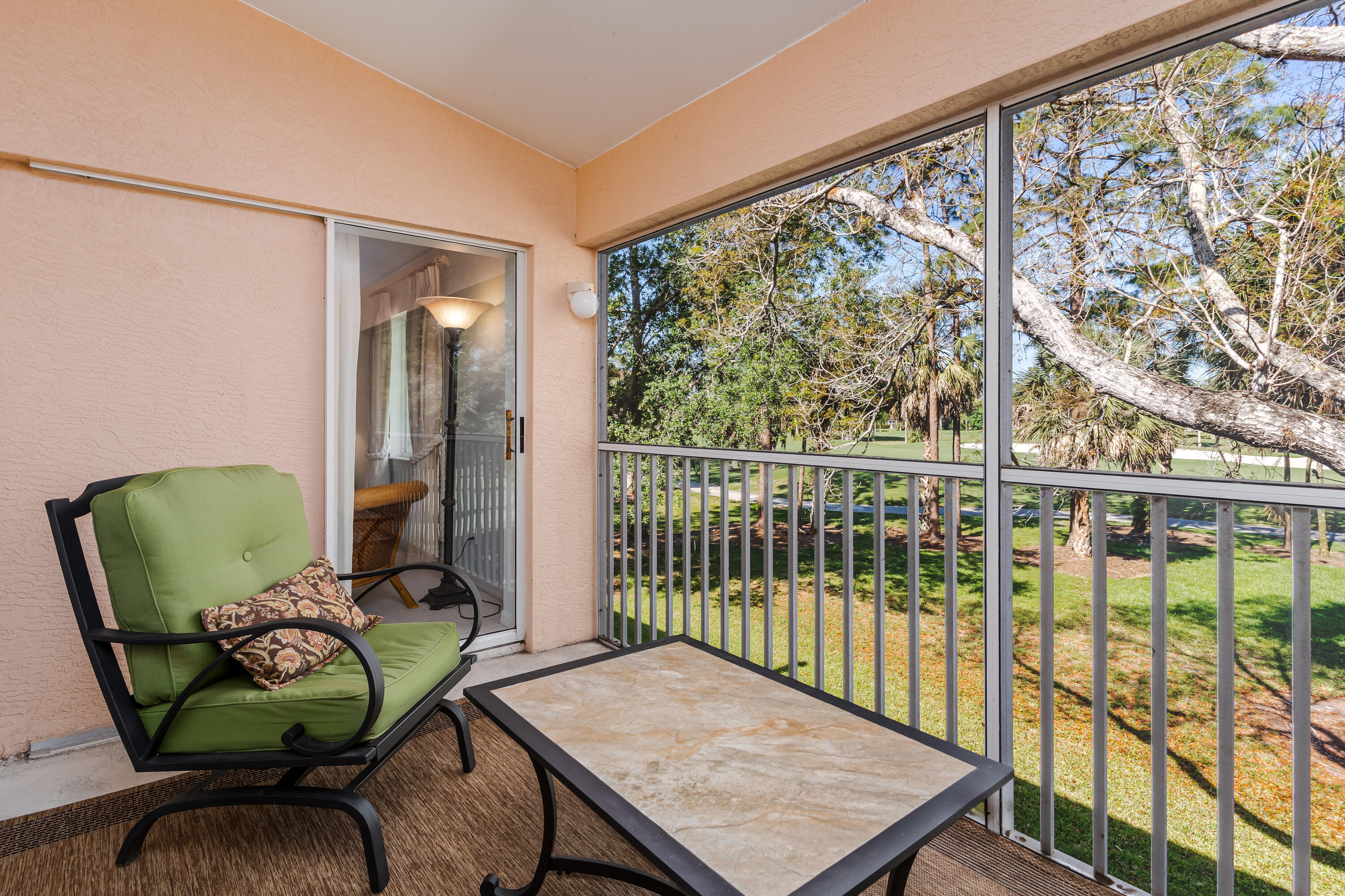 8065 Tiger Cove, Unit 1611 Naples, FL 34113 - Photo 16 of 40 Lanai looking at golf course