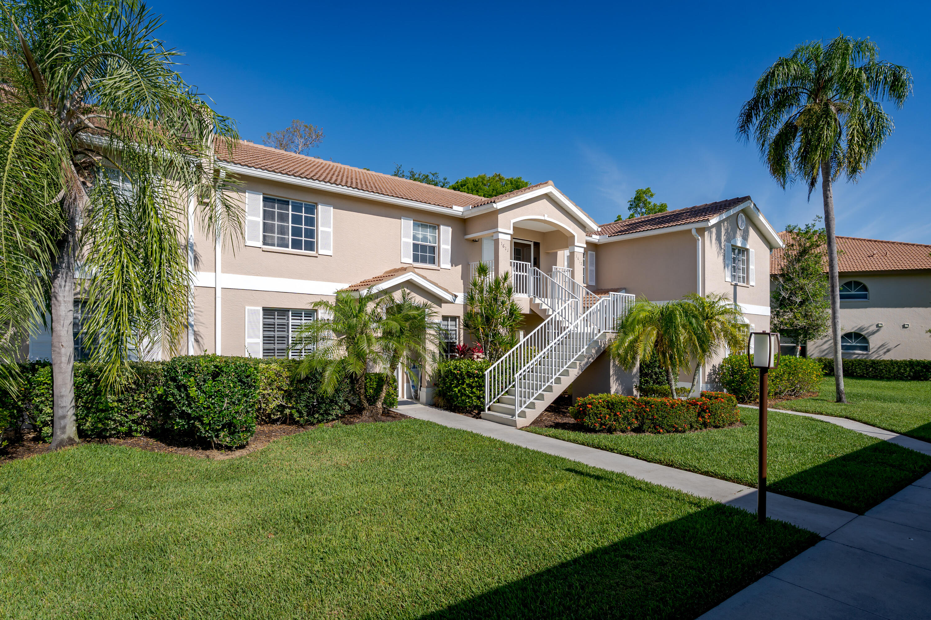 8065 Tiger Cove, Unit 1611 Naples, FL 34113 - Photo 2 of 40 Front view of condo 1611 Tiger Cove