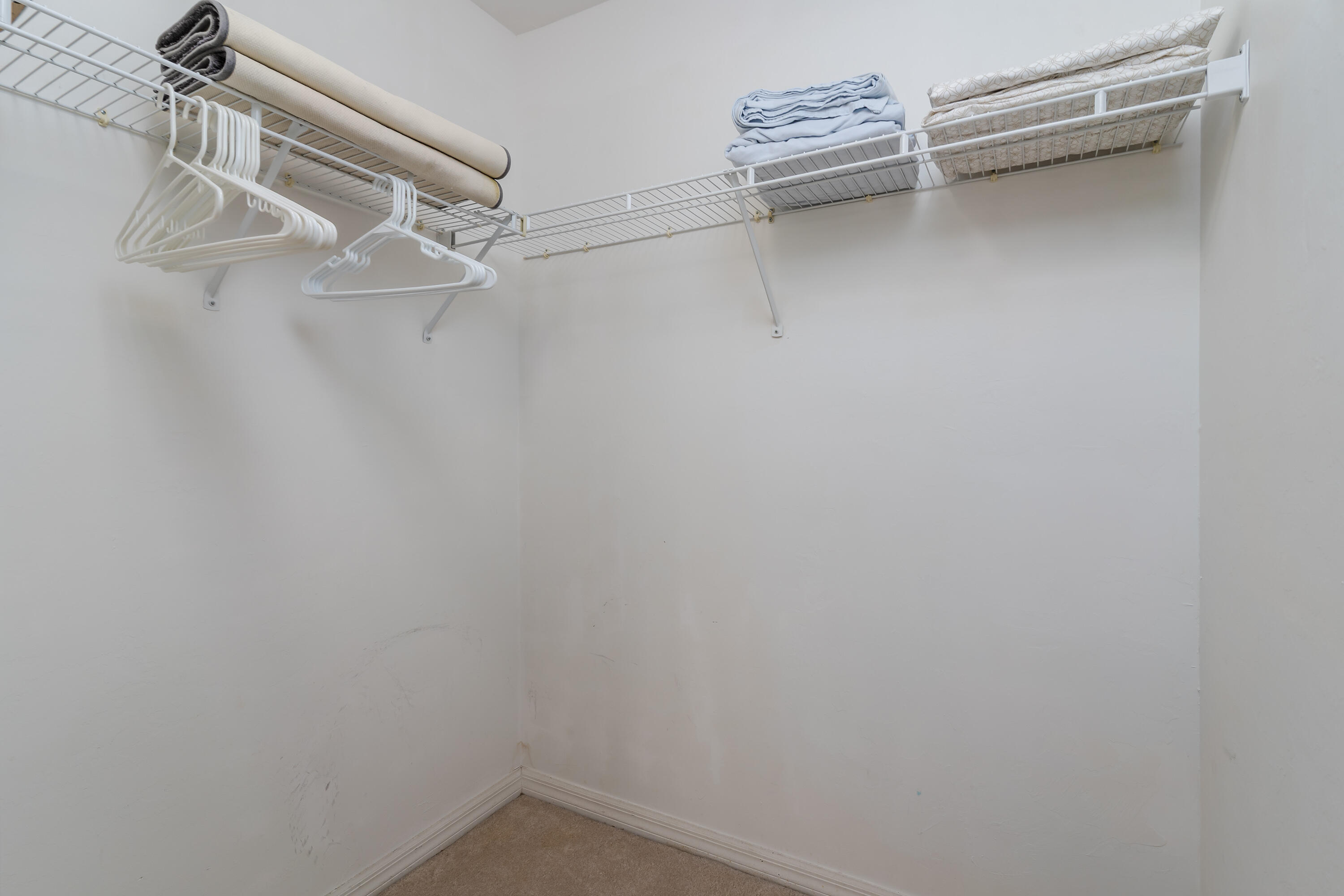 8065 Tiger Cove, Unit 1611 Naples, FL 34113 - Photo 27 of 40 Primary closet