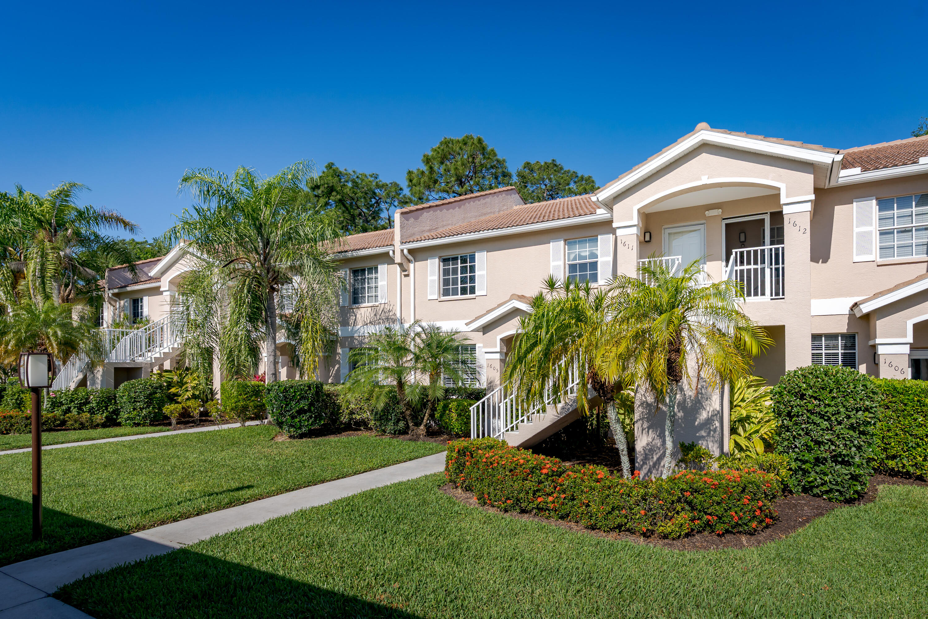 8065 Tiger Cove, Unit 1611 Naples, FL 34113 - Photo 3 of 40 Front view of condo 1611 Tiger Cove