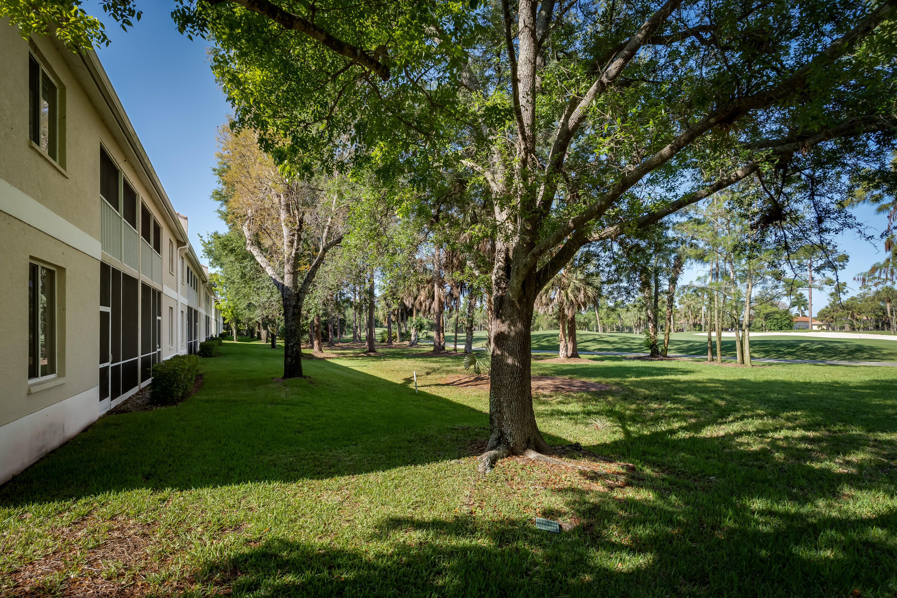 8065 Tiger Cove, Unit 1611 Naples, FL 34113 - Photo 33 of 40 View of condo and golf course