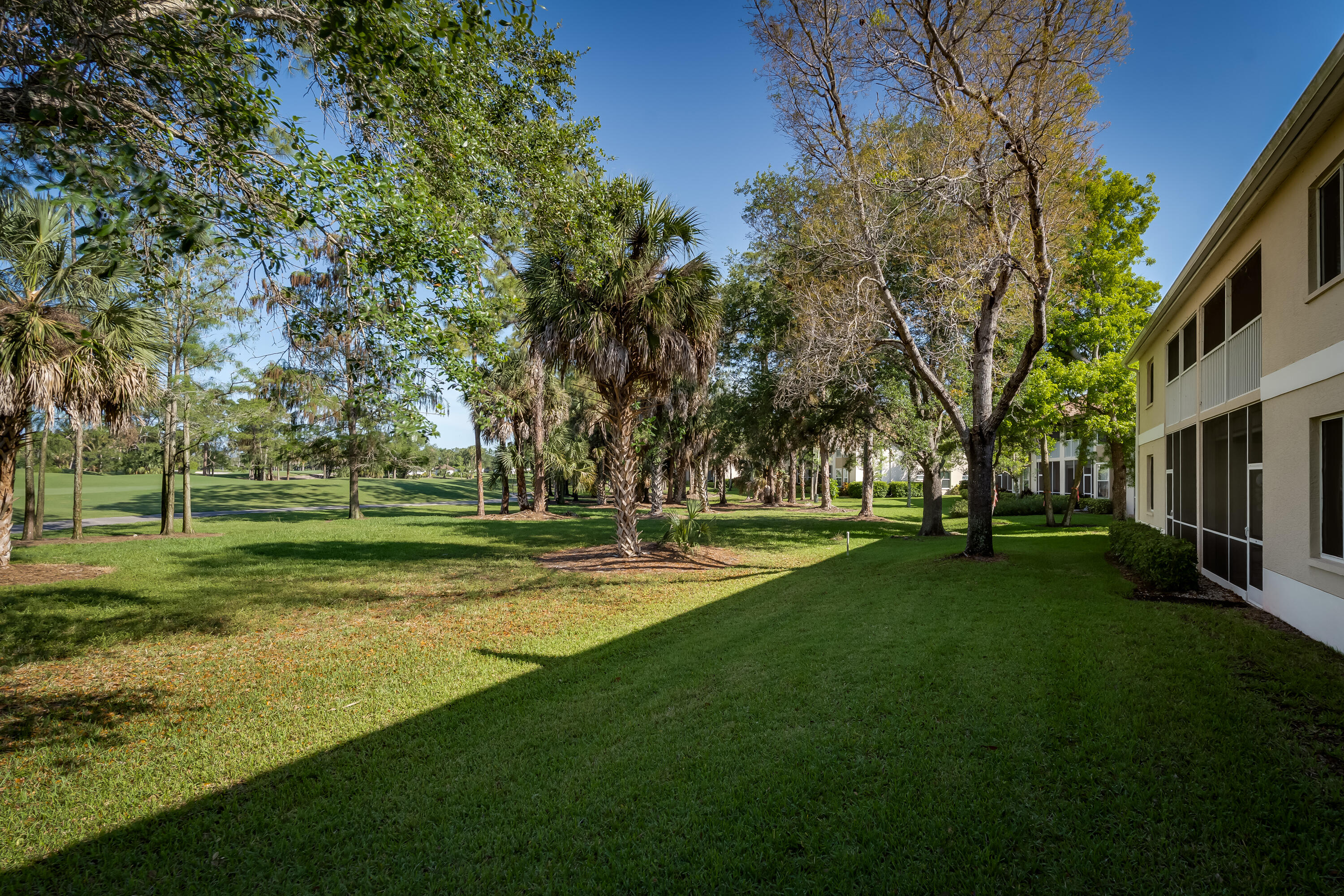 8065 Tiger Cove, Unit 1611 Naples, FL 34113 - Photo 34 of 40 View of condo and golf course