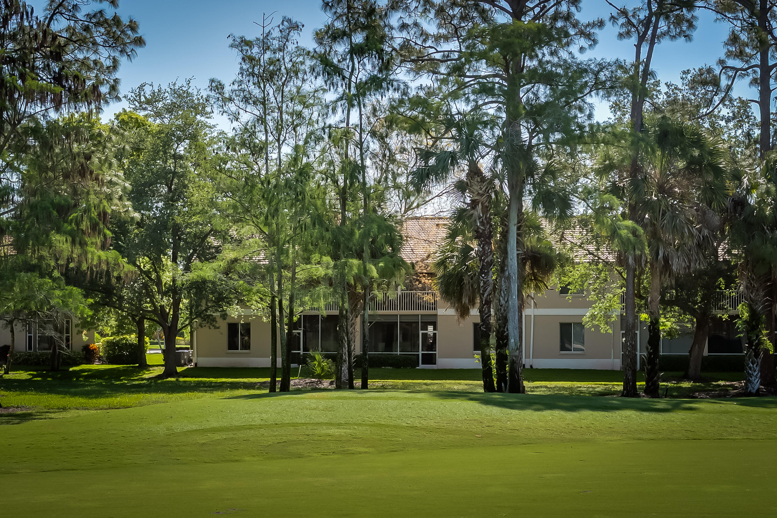 8065 Tiger Cove, Unit 1611 Naples, FL 34113 - Photo 35 of 40 View of condo and golf course