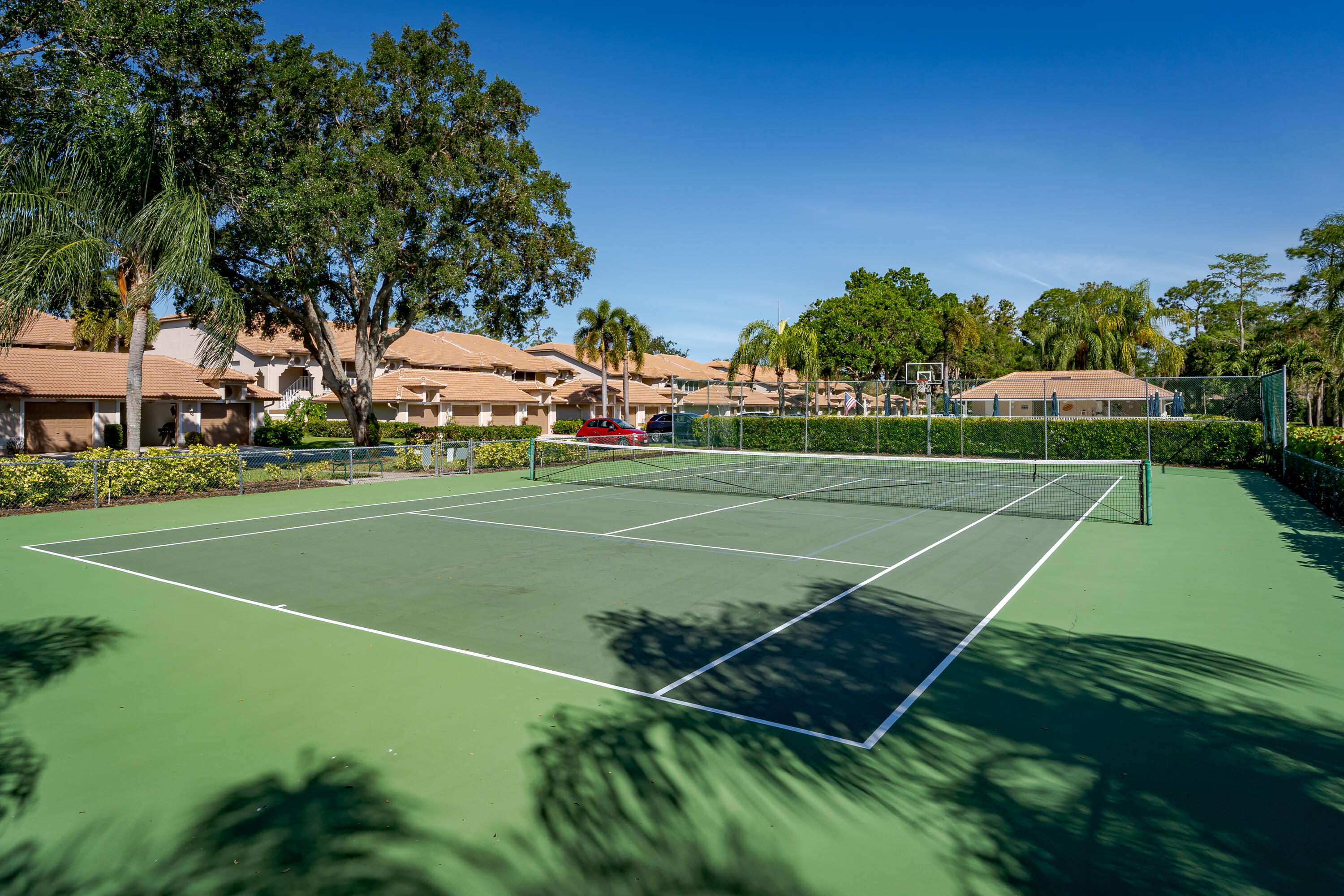 8065 Tiger Cove, Unit 1611 Naples, FL 34113 - Photo 38 of 40 Tennis Court