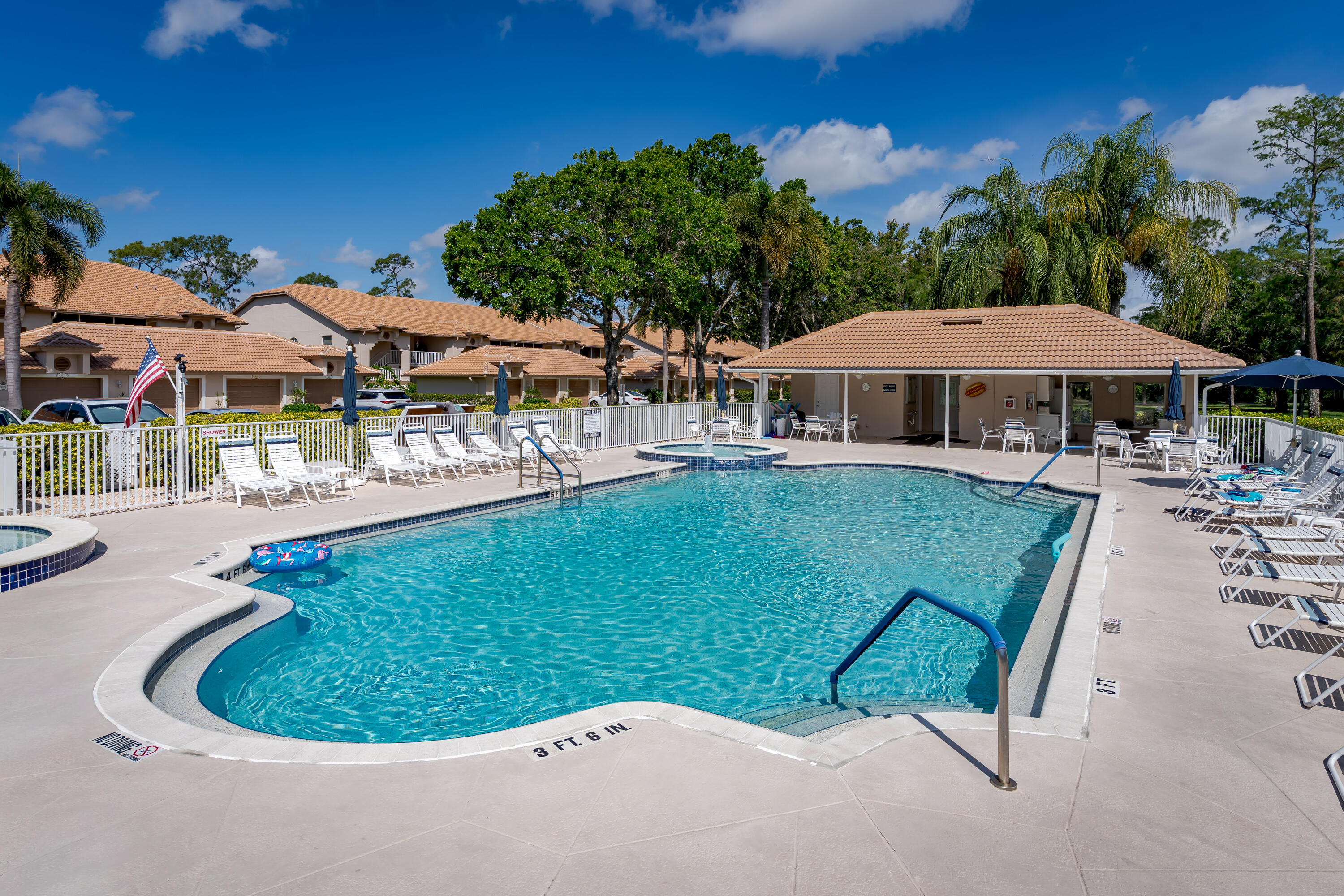 8065 Tiger Cove, Unit 1611 Naples, FL 34113 - Photo 40 of 40 40 Swimming pool and club house