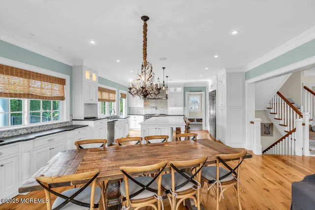 a room with furniture and a flat screen tv