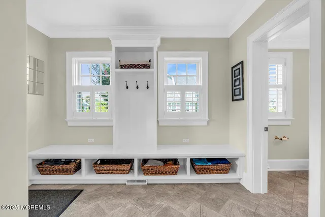 a bathroom with a toilet a sink and a mirror