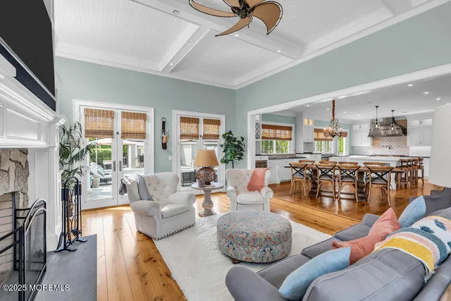 a spacious bedroom with a bed and a fireplace