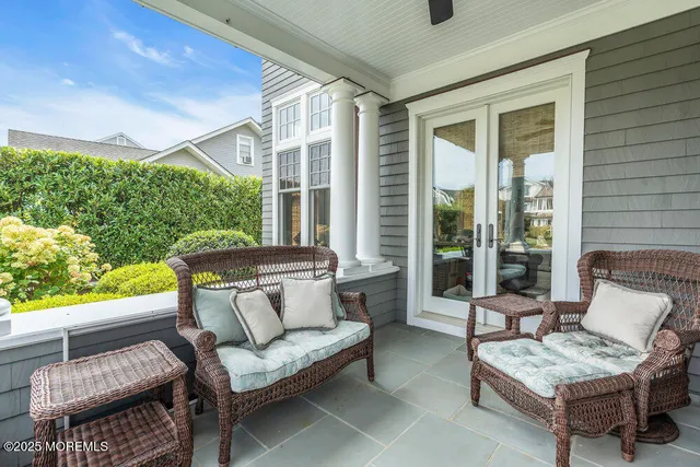 a outdoor living space with furniture and a potted plant