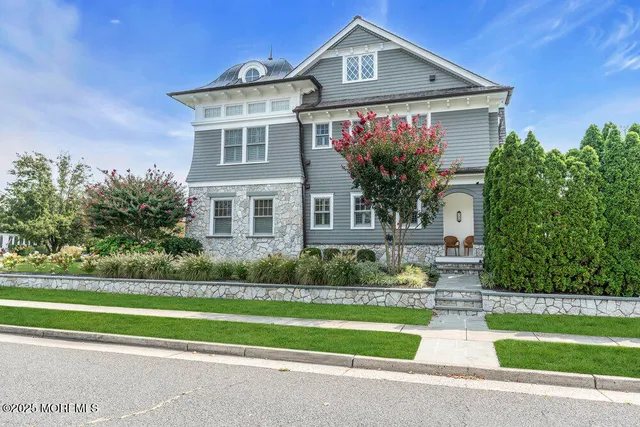 a view of a dinning table and chairs in patio of the house