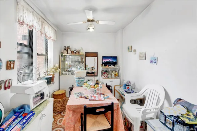a view of a livingroom with furniture and a chandelier