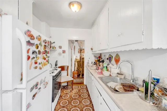 a bathroom with a sink a bath tub and a shower