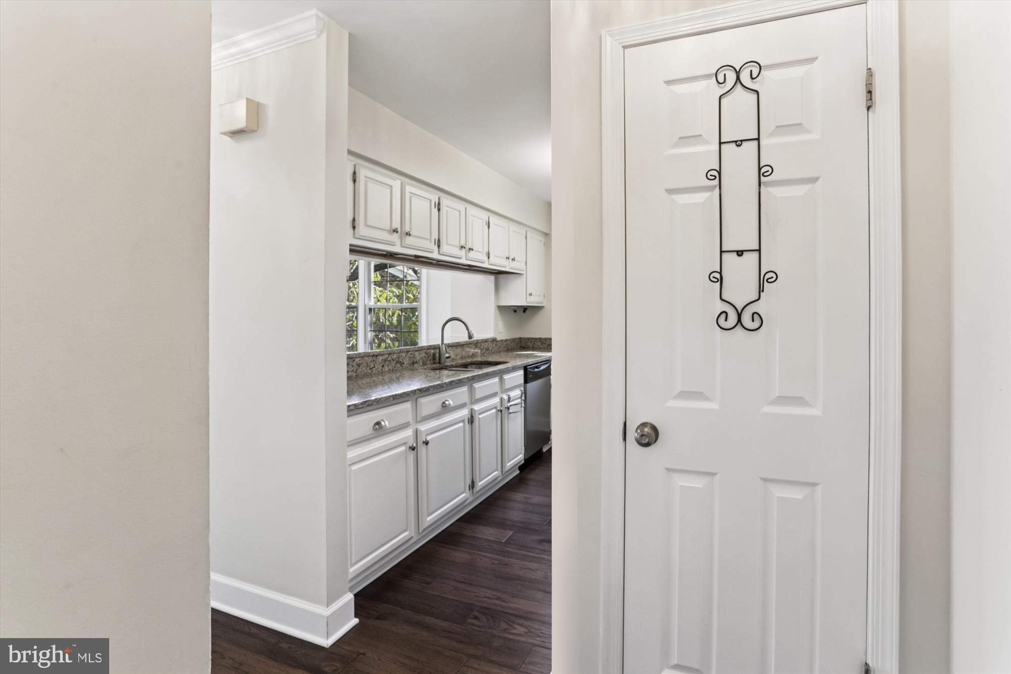 945 South Scott Street Arlington, VA 22204 - Photo 11 of 39 a kitchen with cabinets and stainless steel appliances