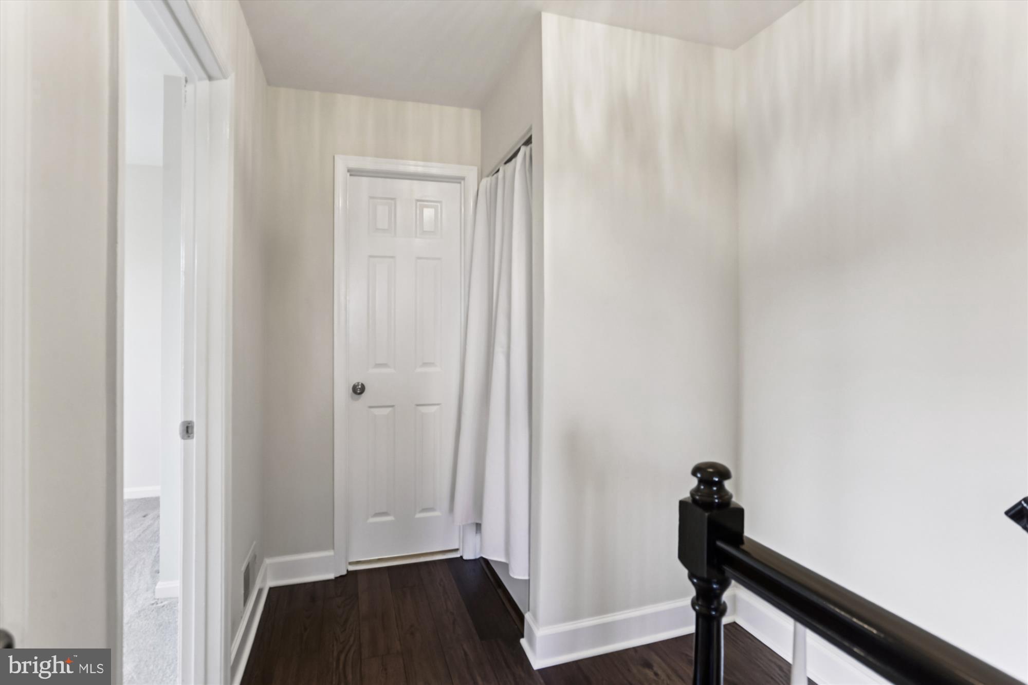 945 South Scott Street Arlington, VA 22204 - Photo 28 of 39 a view of a room with wooden floor and front door