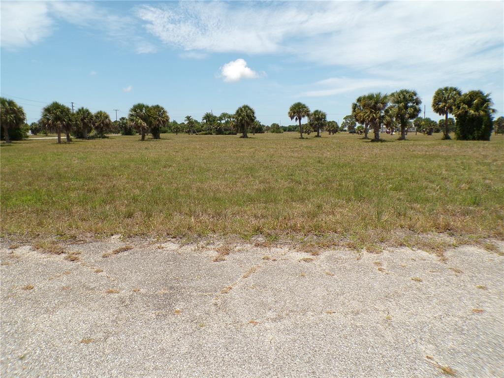 3 Birch Court Placida, FL 33946 - Photo 3 of 10 a view of a beach with a building in the background