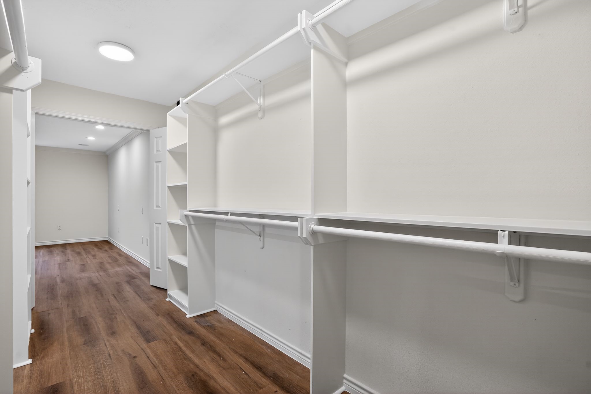 27 Deerfield Road Huntsville, TX 77340 - Photo 37 of 46 a view of a room with wooden floor