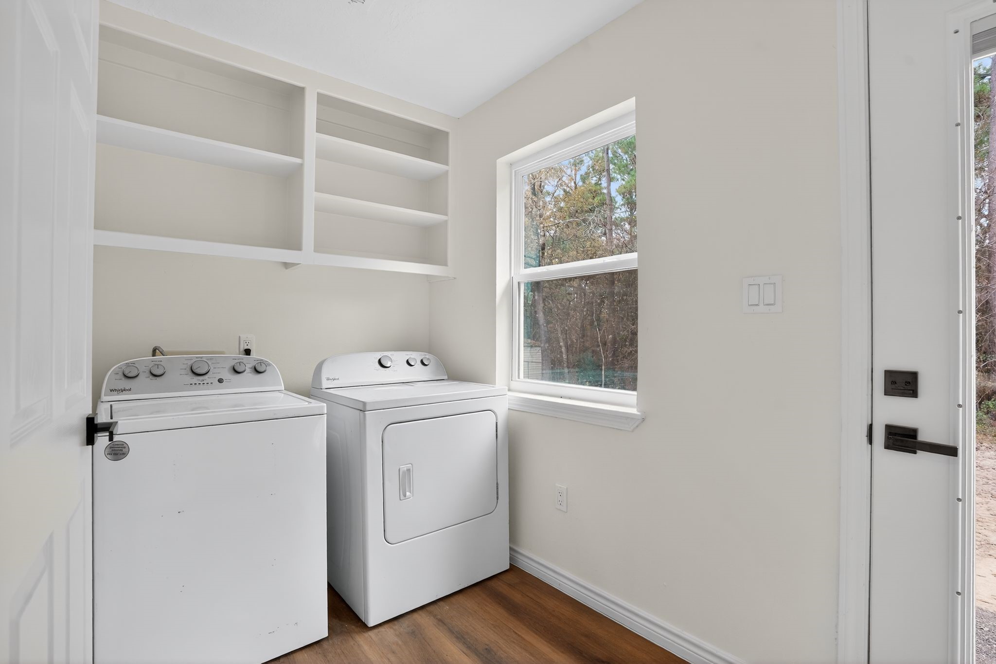 27 Deerfield Road Huntsville, TX 77340 - Photo 43 of 46 a utility room with dryer and washer