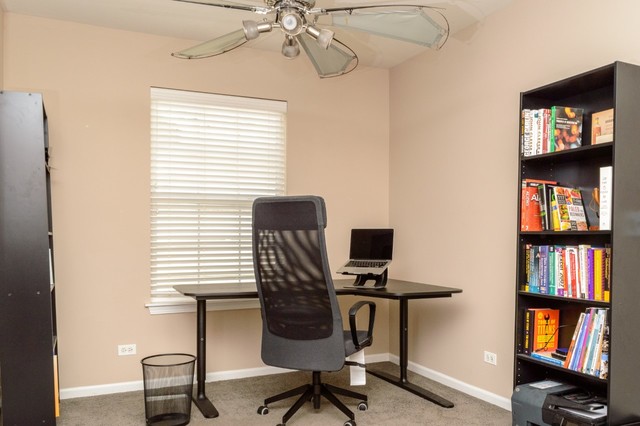 229 Ridge Road North Aurora, IL 60542 - Photo 17 of 18 a view of a workspace with furniture and a window