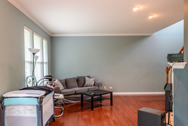 229 Ridge Road North Aurora, IL 60542 - Photo 7 of 18 a living room with furniture and a window
