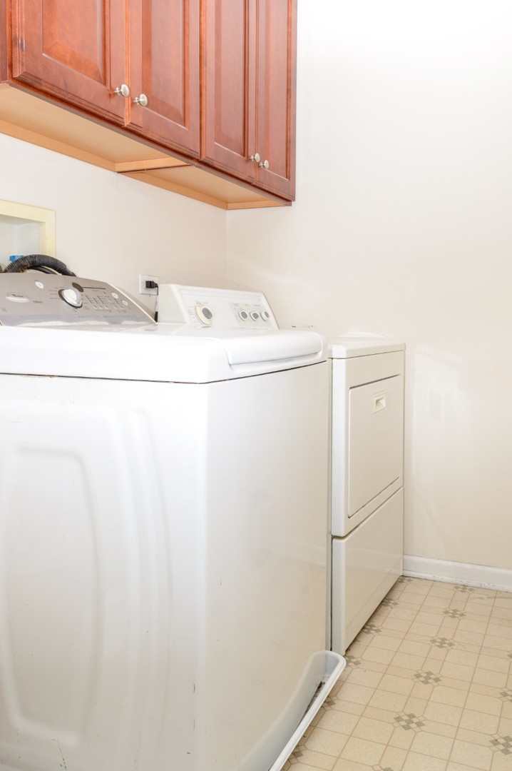 229 Ridge Road North Aurora, IL 60542 - Photo 10 of 18 a utility room with dryer and washer