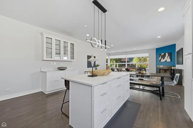a view of living room with granite countertop furniture and fireplace