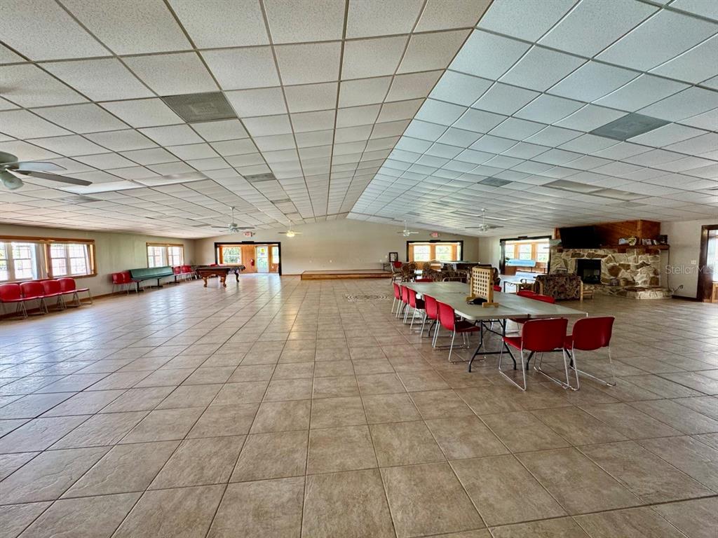 15991 Northeast 243rd Place Road, Unit 56 Fort McCoy, FL 32134 - Photo 12 of 16 a view of a room with gym equipment