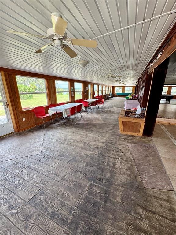 15991 Northeast 243rd Place Road, Unit 56 Fort McCoy, FL 32134 - Photo 14 of 16 a view of a room with gym equipment
