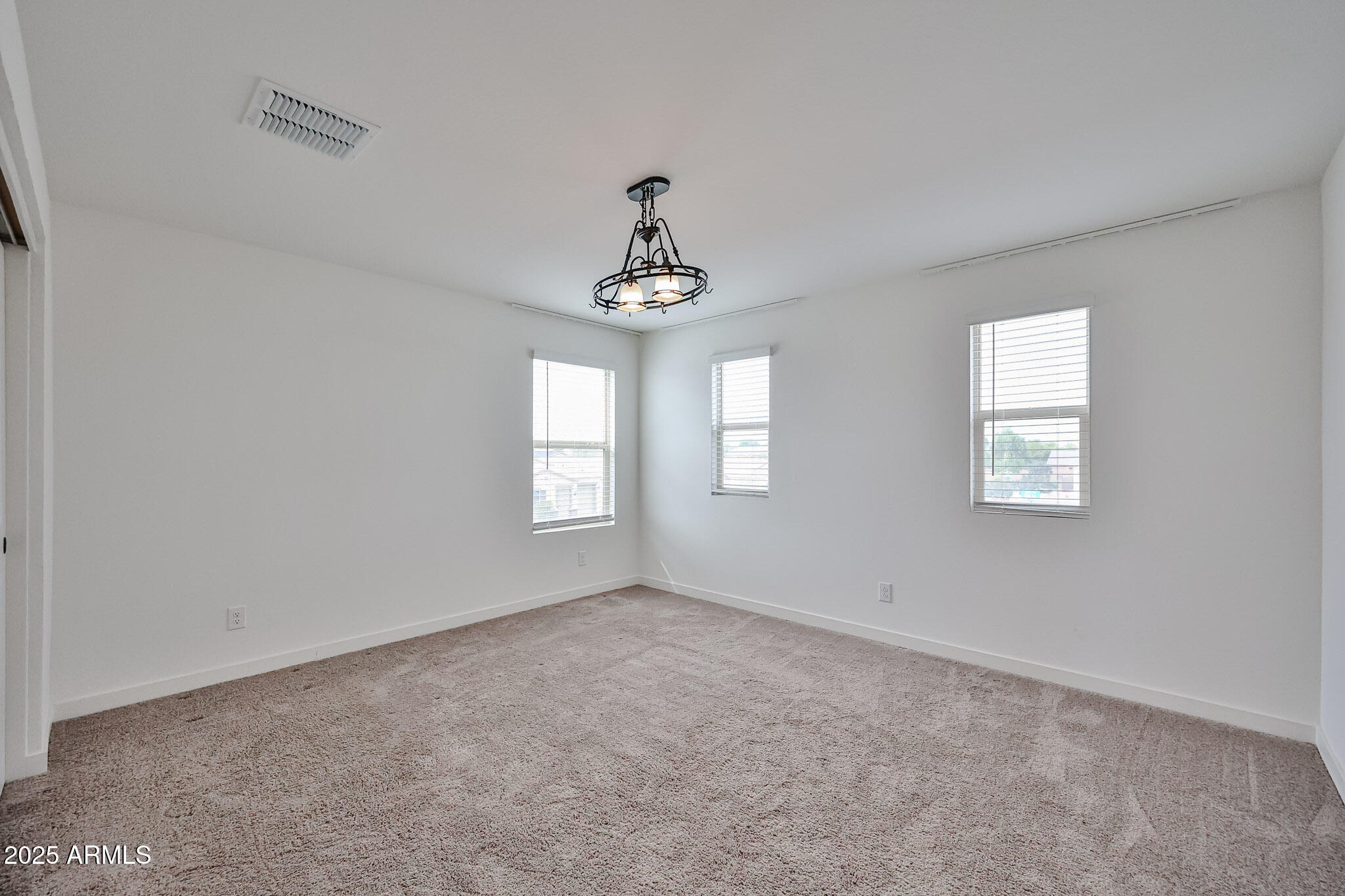509 East Elm Lane Avondale, AZ 85323 - Photo 21 of 40 a view of empty room with window