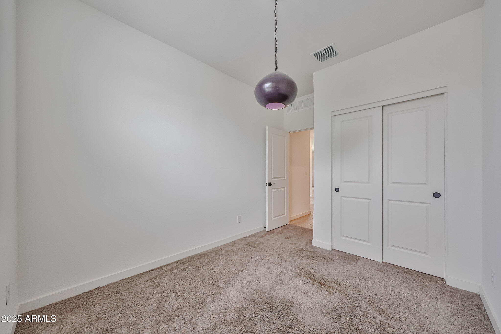 509 East Elm Lane Avondale, AZ 85323 - Photo 30 of 40 a view of an empty room with a window