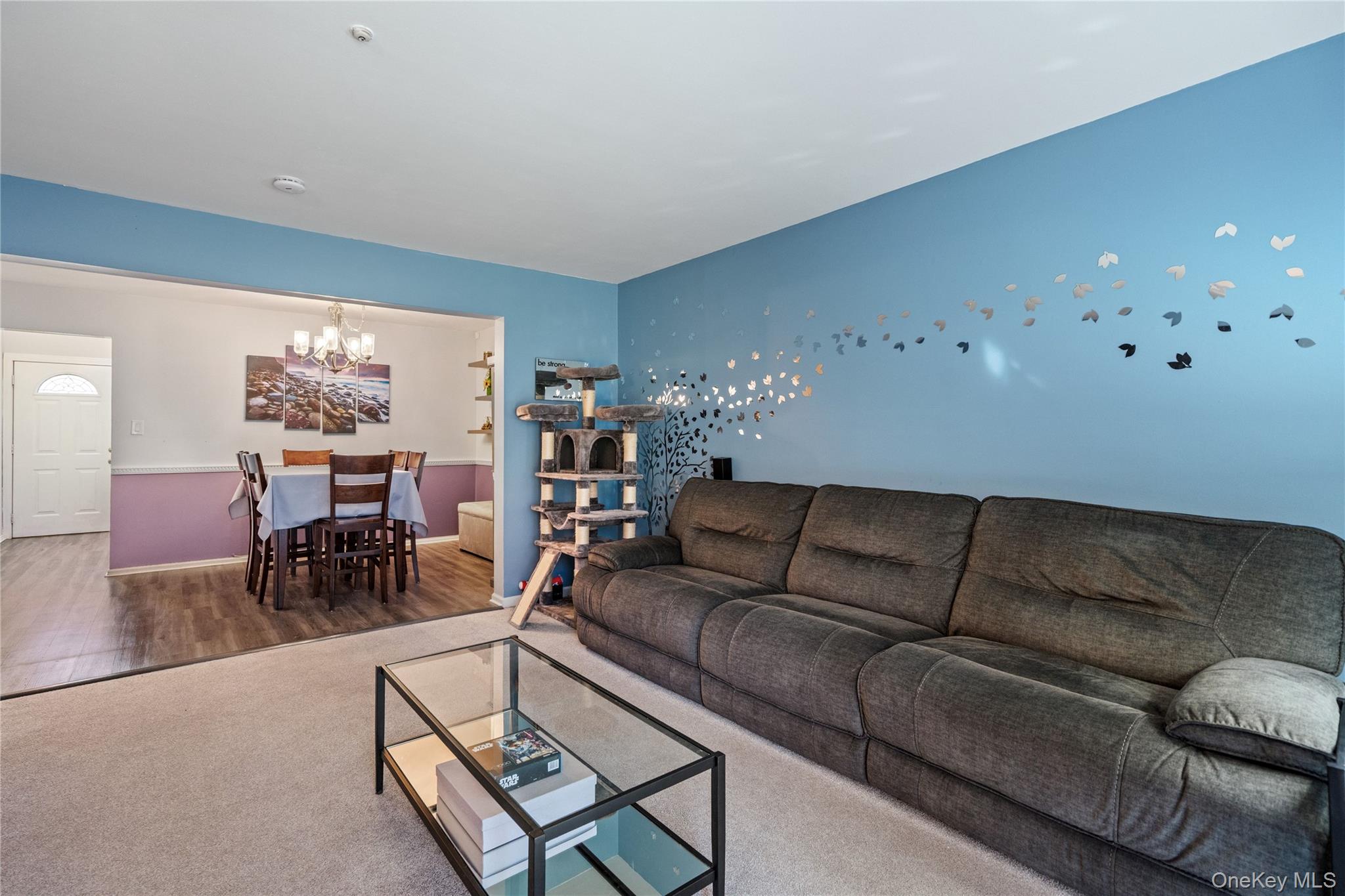 7 Maple Court, Unit 7 Selden, NY 11784 - Photo 14 of 18 a living room with furniture