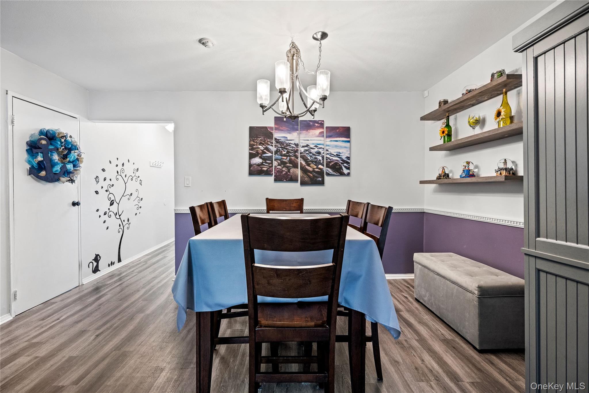 7 Maple Court, Unit 7 Selden, NY 11784 - Photo 10 of 18 a view of a dining room with furniture and wooden floor