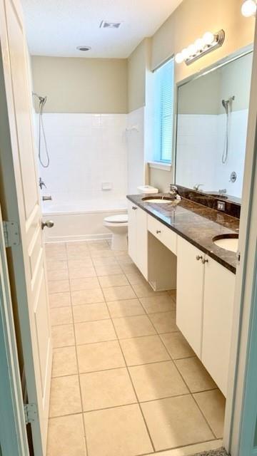 10 Perimeter Summit Boulevard, Unit 1310 Atlanta, GA 30319 - Photo 12 of 24 a bathroom with a granite countertop sink a mirror and bathtub