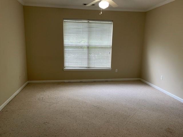 10 Perimeter Summit Boulevard, Unit 1310 Atlanta, GA 30319 - Photo 15 of 24 an empty room with a window