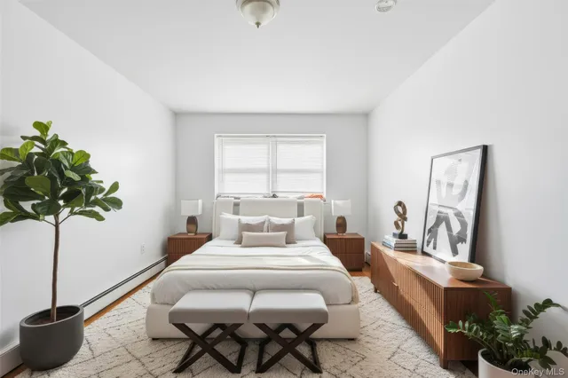 a dining room with furniture and chandelier